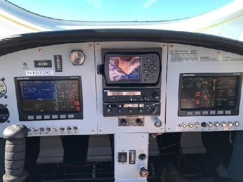 Close-up of the aircraft's instrument panel, including avionics and controls.