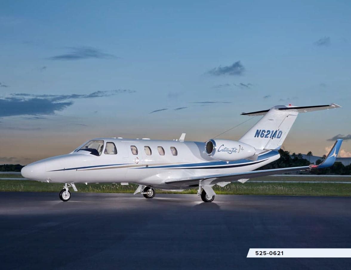 A Citation Jet CJ1+ aircraft with registration N621AD is parked on the tarmac.