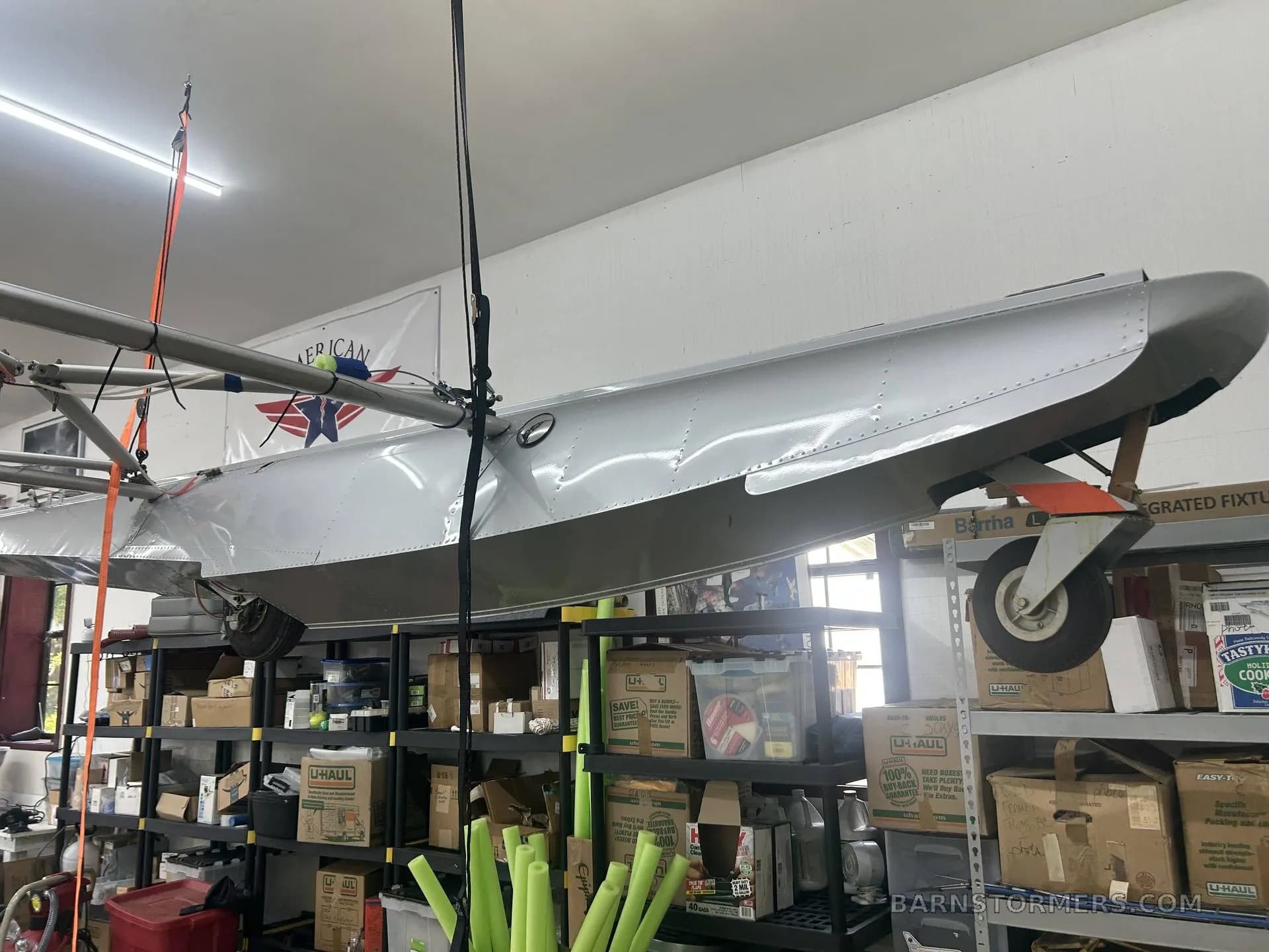 Another view of a float in a workshop, showcasing its design.