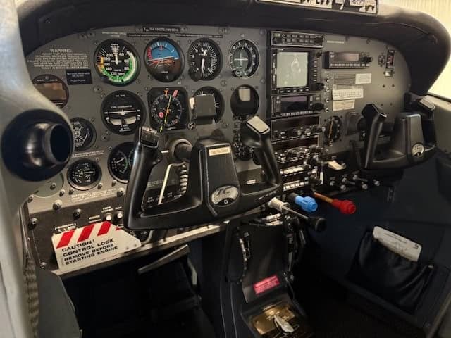 Detailed view of the aircraft's instrument panel and controls.
