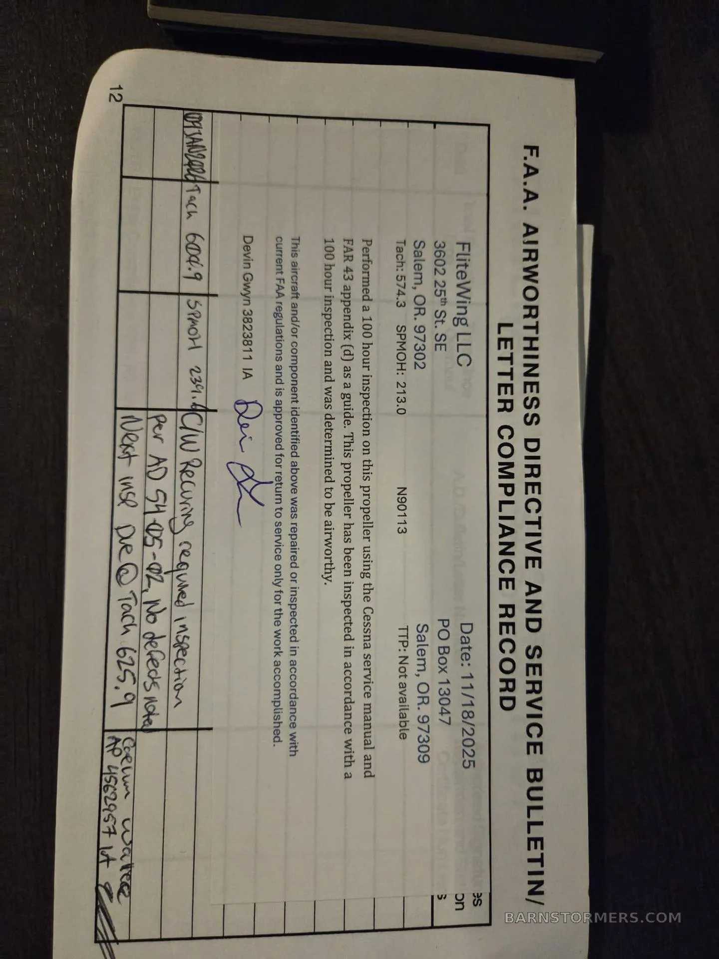 A close-up of an FAA Airworthiness Directive and Service Bulletin Letter Compliance Record document.