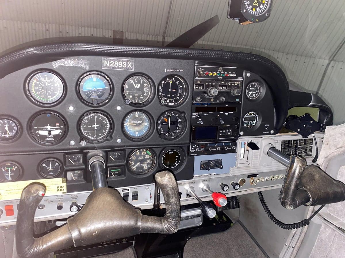 Instrument panel of a Cessna 177 Cardinal, showing various gauges and controls.