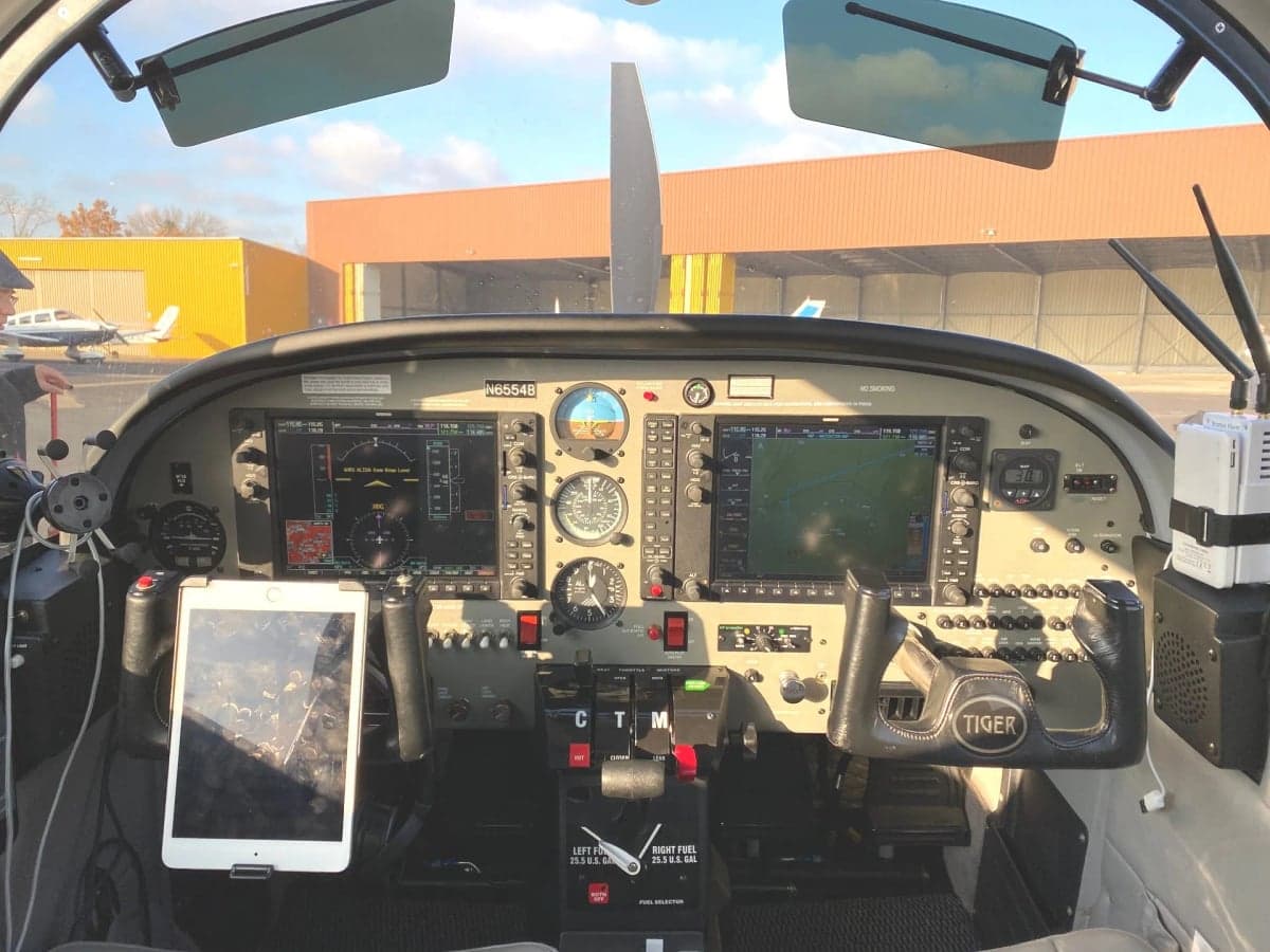 Interior view of the aircraft's front seats and controls.