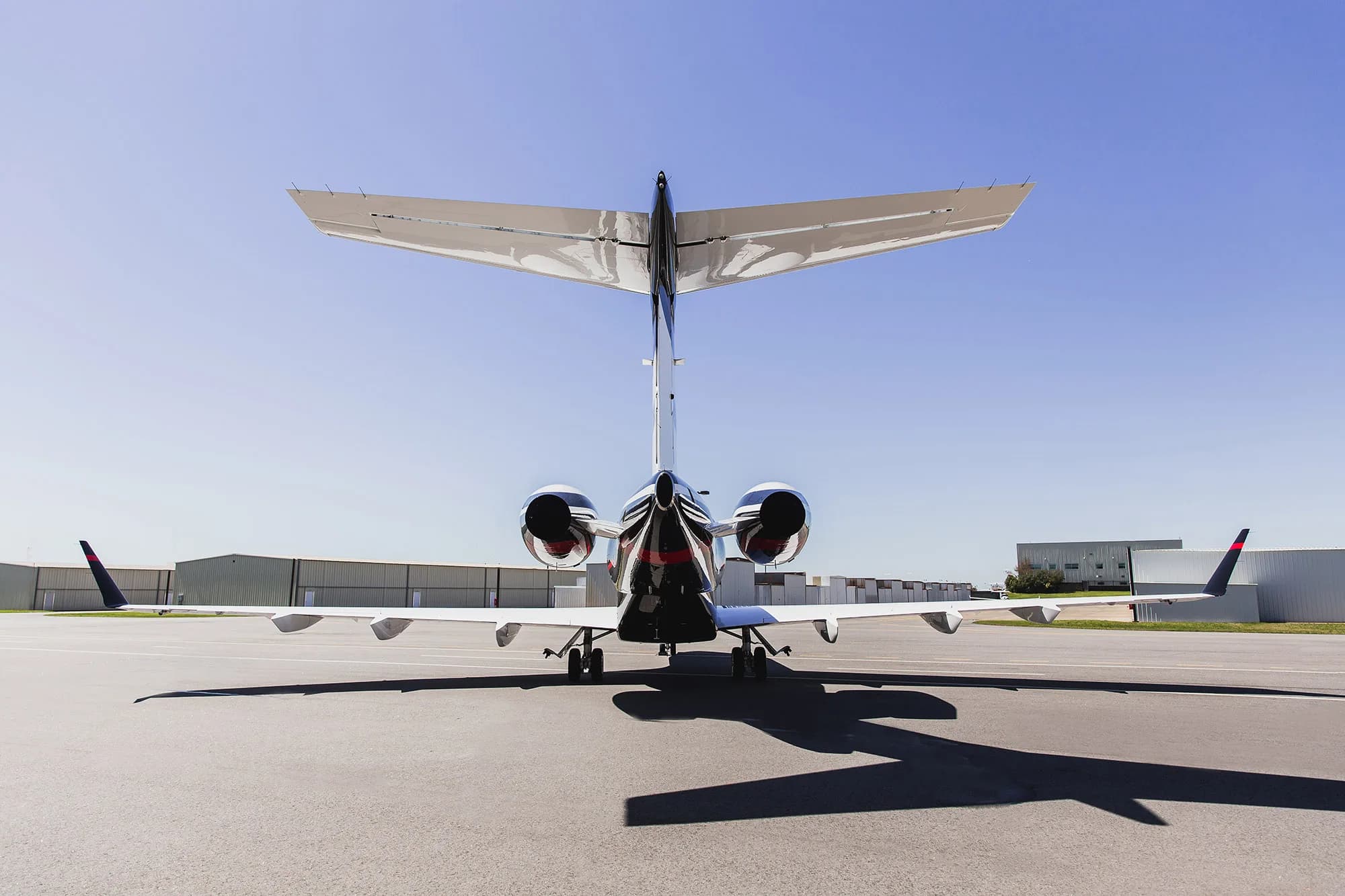 Rear view of the N300WK aircraft on the tarmac.