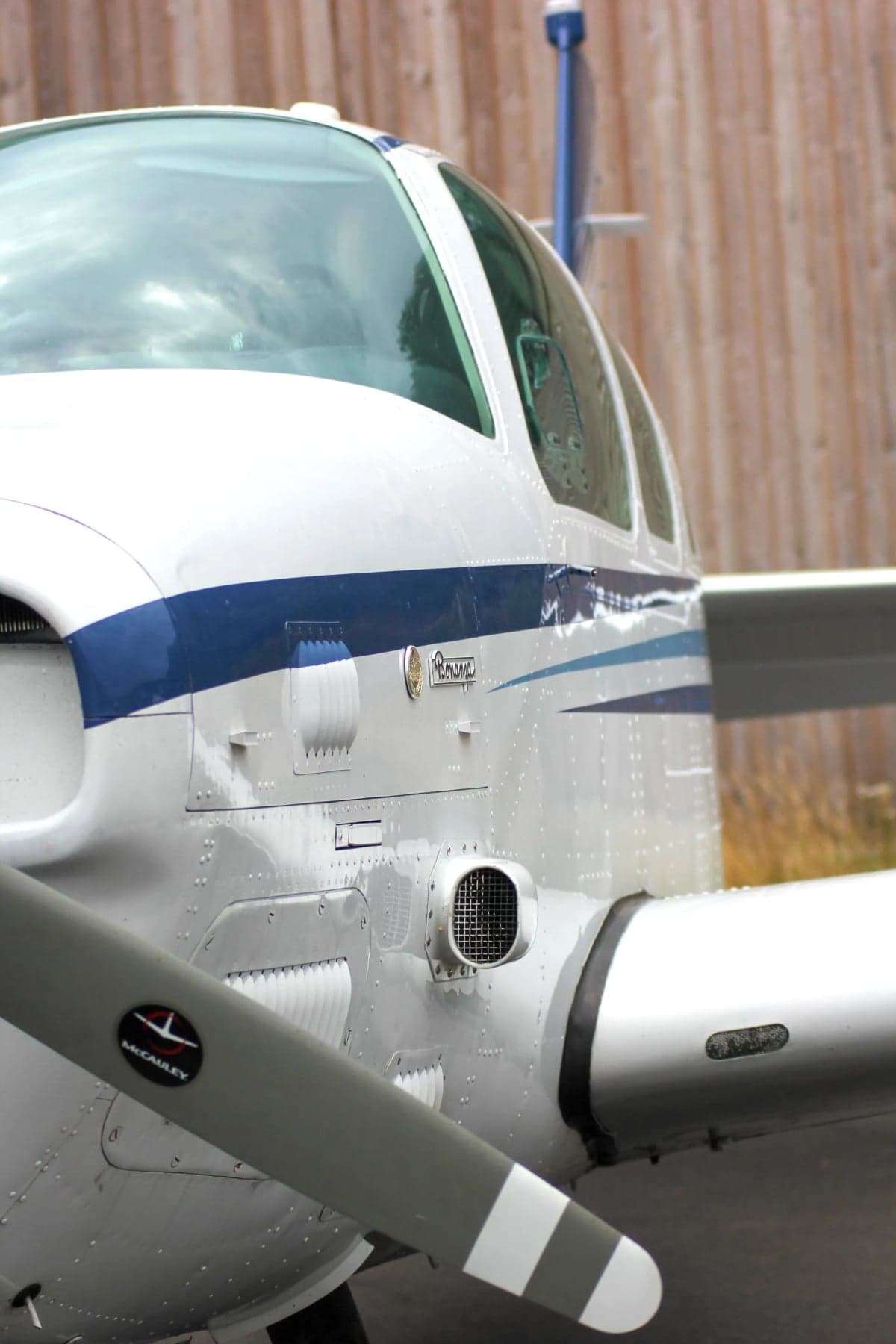 Close up of the nose and propeller of N225CR Beechcraft Bonanza.