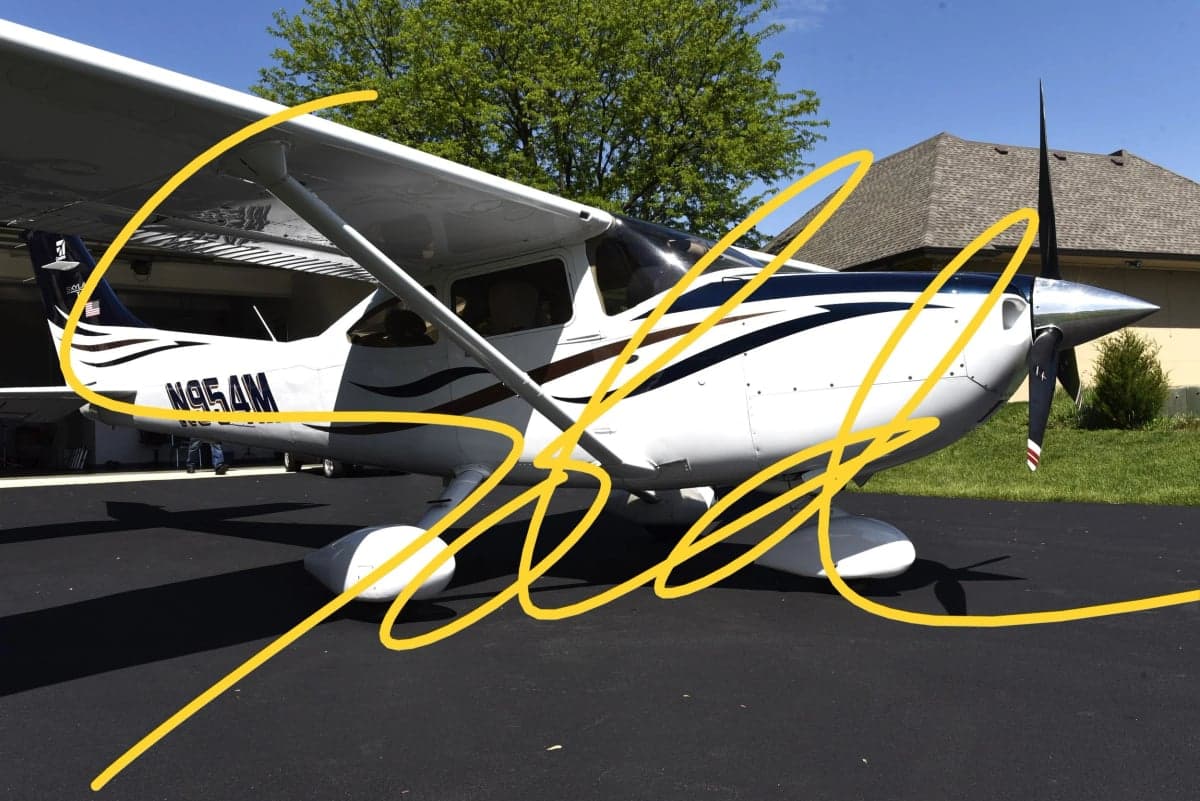 A Cessna 172 Skyhawk with a white and blue paint scheme is parked on the tarmac with "SOLD" overlaid.