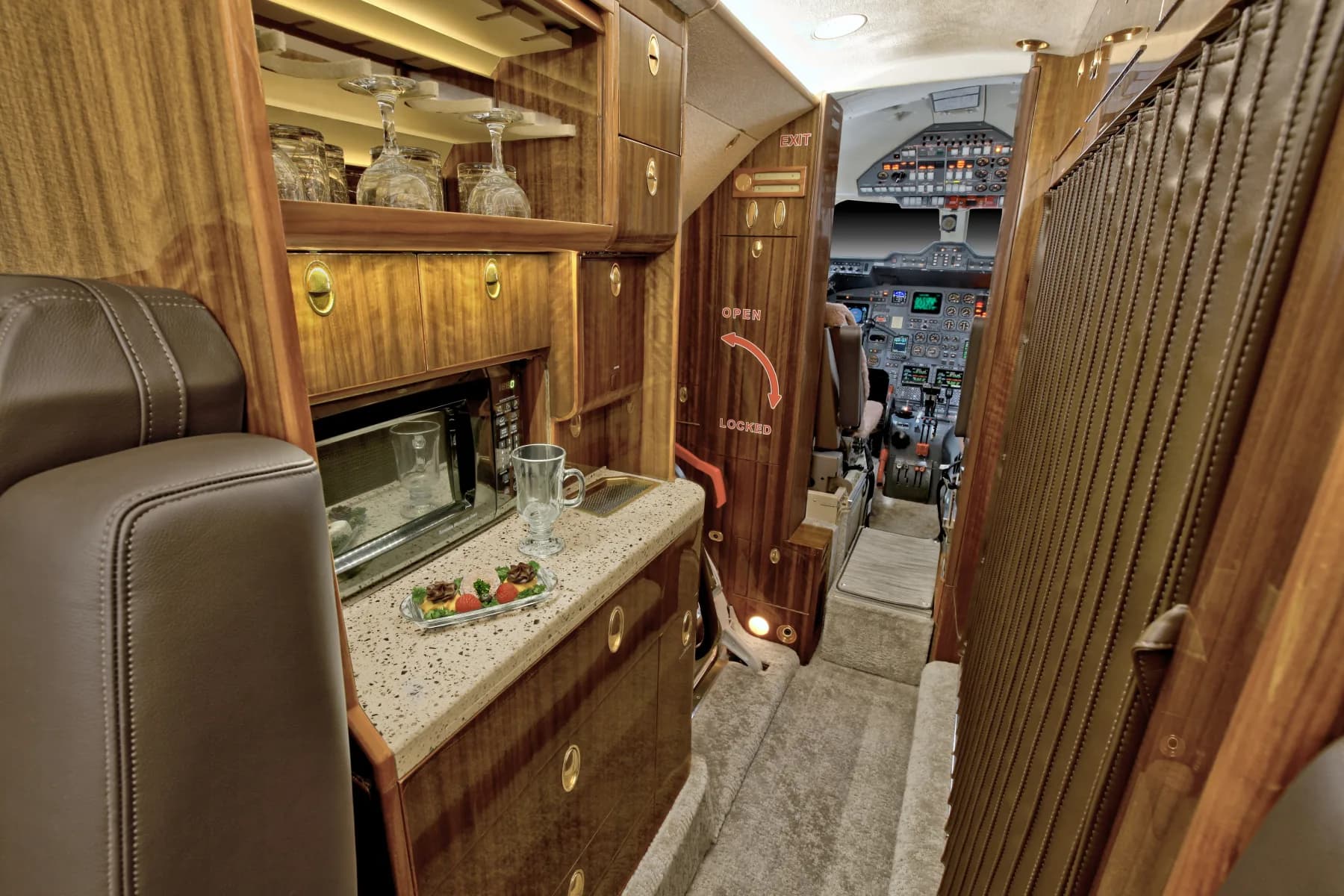 View of the aircraft's interior galley and cockpit.