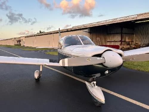 Close up front view of Piper PA-28-181 Archer II aircraft N1435T on the tarmac.