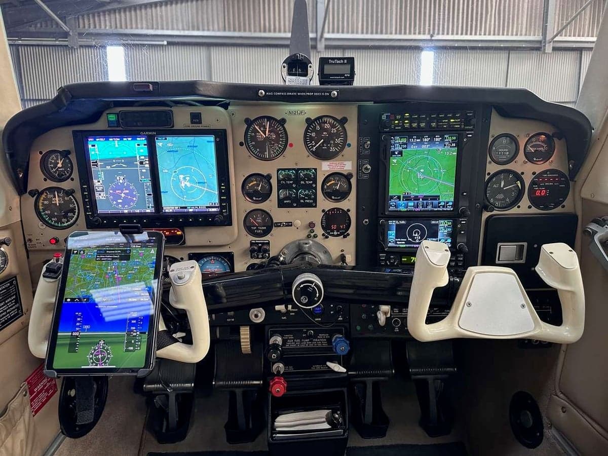 The cockpit of a Beechcraft Bonanza with modern avionics.