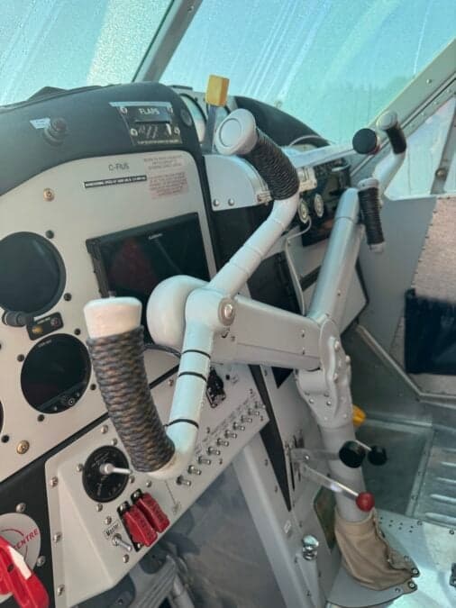 View of the de Havilland Canada DHC-3 Otter's control yoke and instrument panel.
