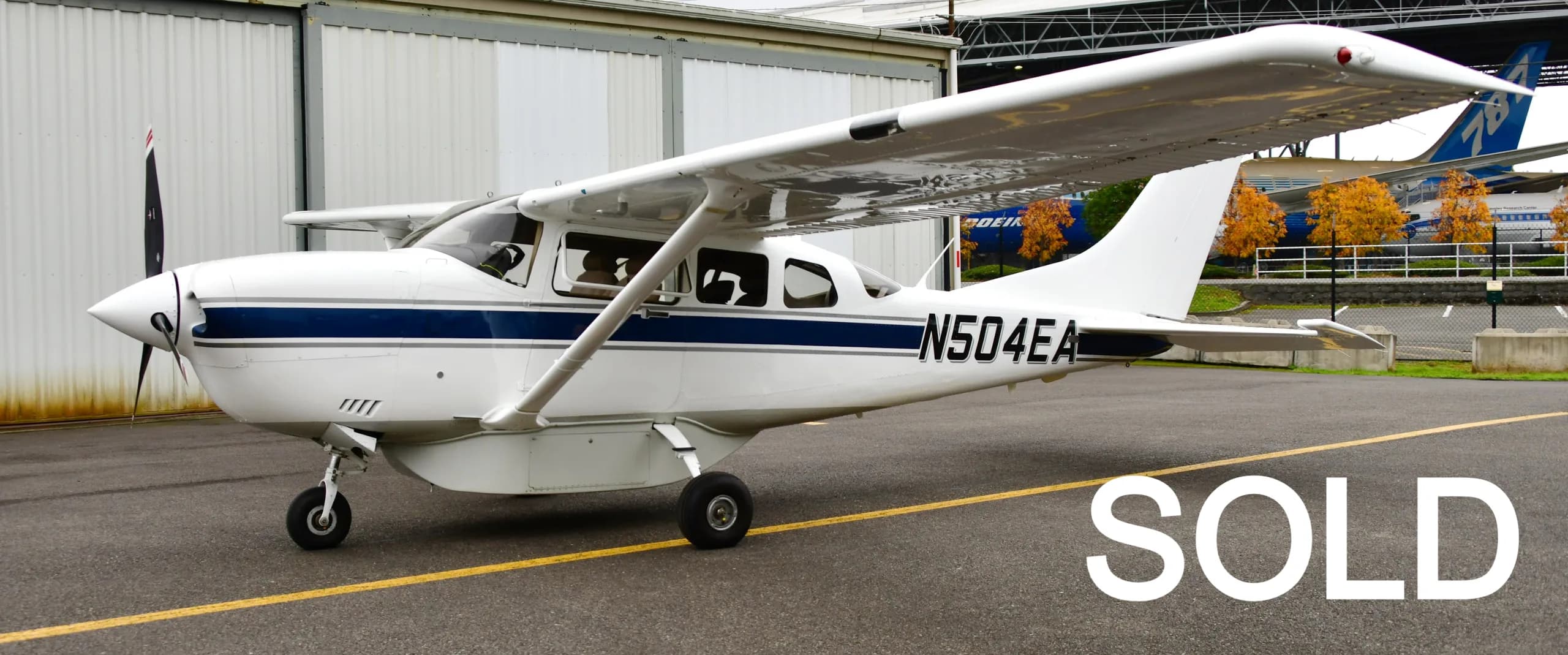 A Cessna 206 Turbo Stationair on the tarmac with a SOLD overlay.