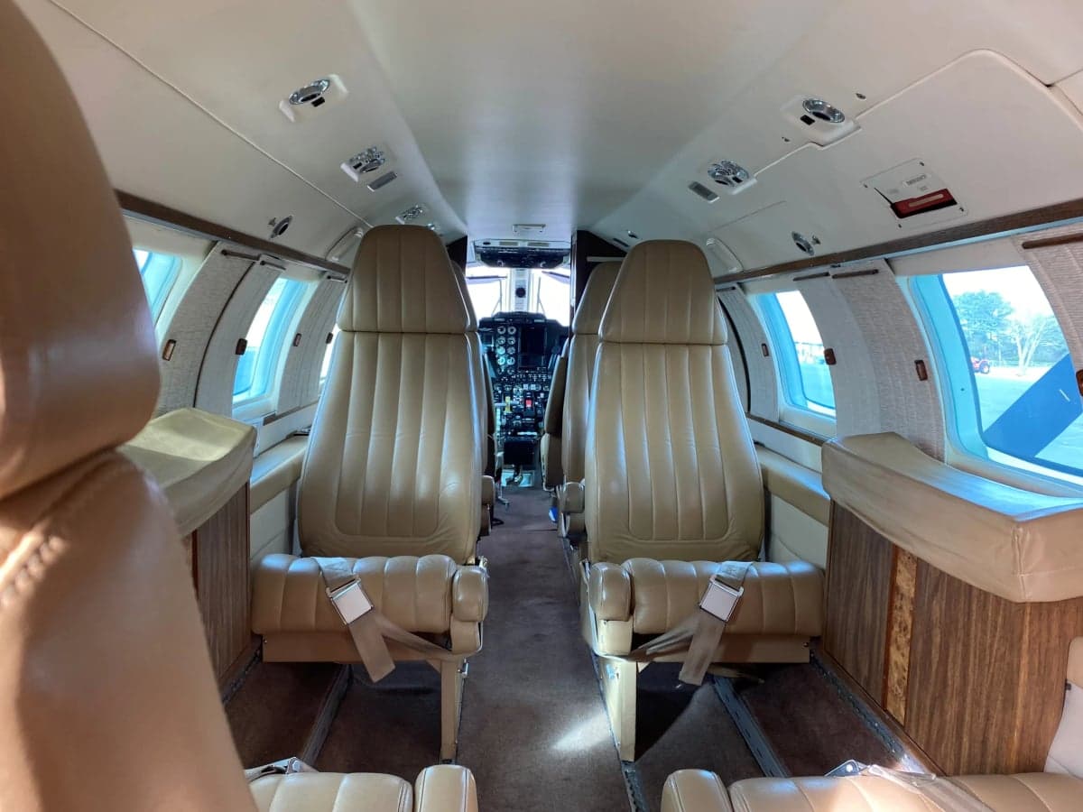 View of the cabin seats and cockpit inside the Mitsubishi MU-300 Diamond.