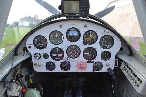 Close-up of the aircraft's instrument panel and cockpit controls.