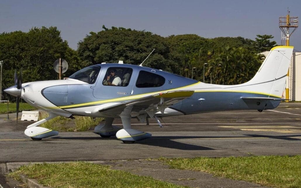 Side view of a Cirrus SR22T on the ground.