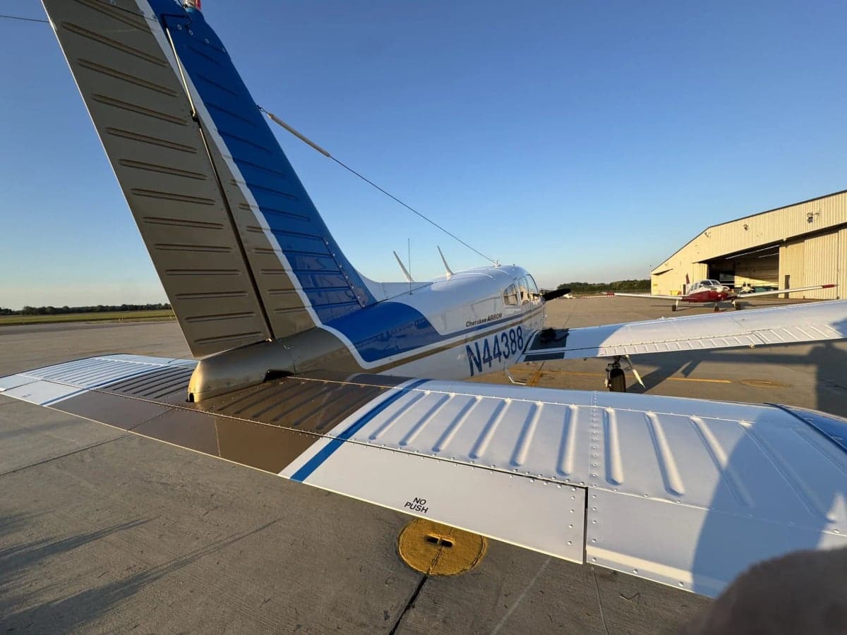 Rear view of the Cherokee Arrow N44388 showing the tail and wing.