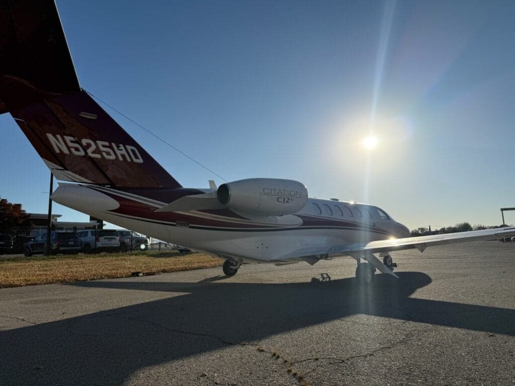 N525HD Cessna Citation CJ2+ with open door on the tarmac.