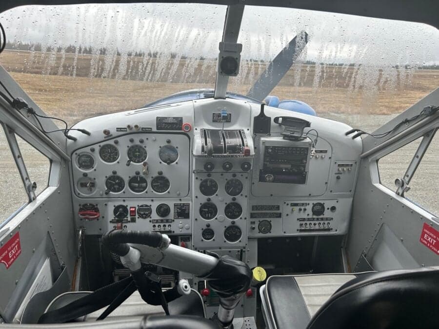 View of the instrument panel and controls in the cockpit of the aircraft.