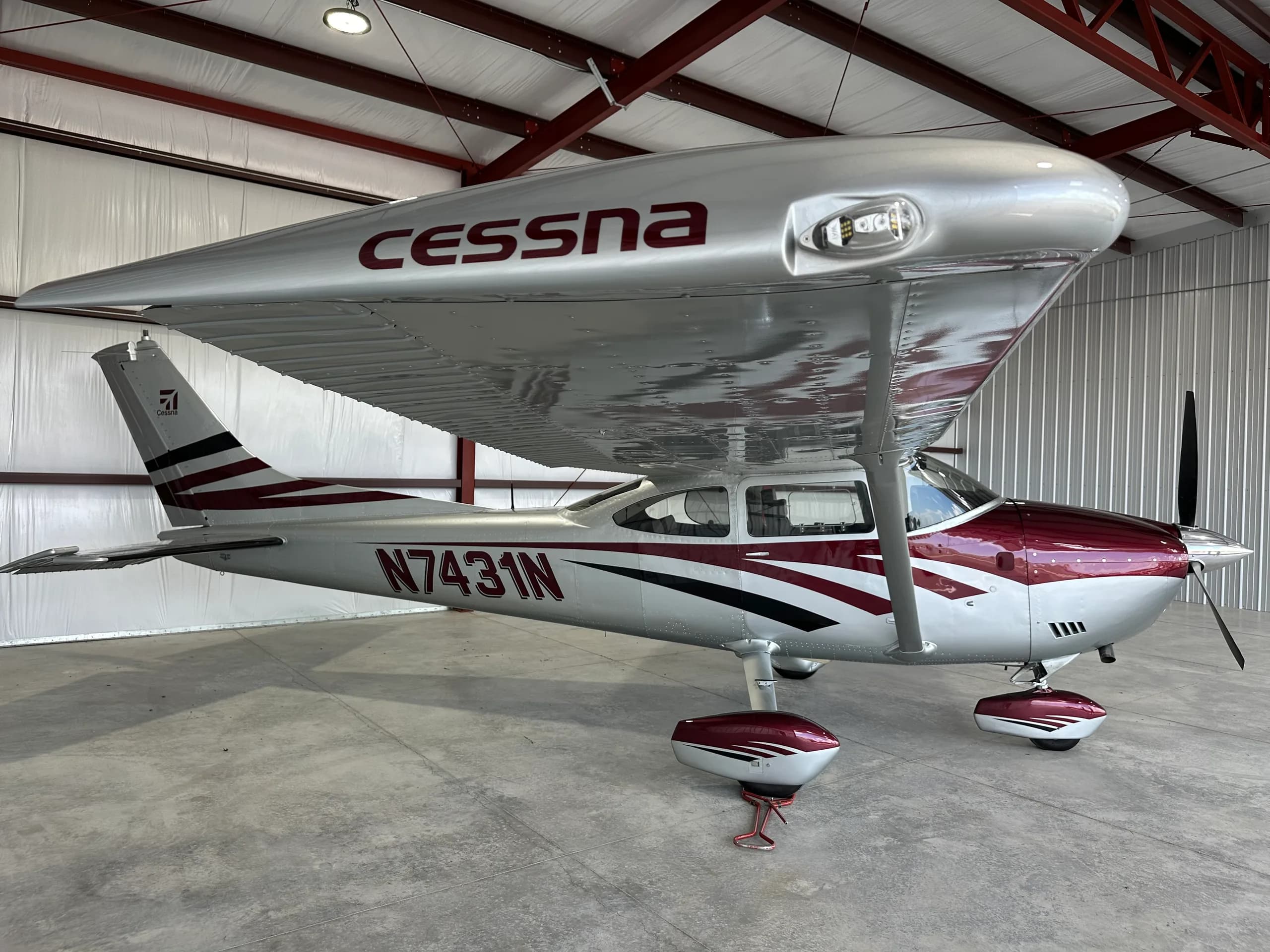 Cessna 182 Skylane N7431N parked inside a hangar.