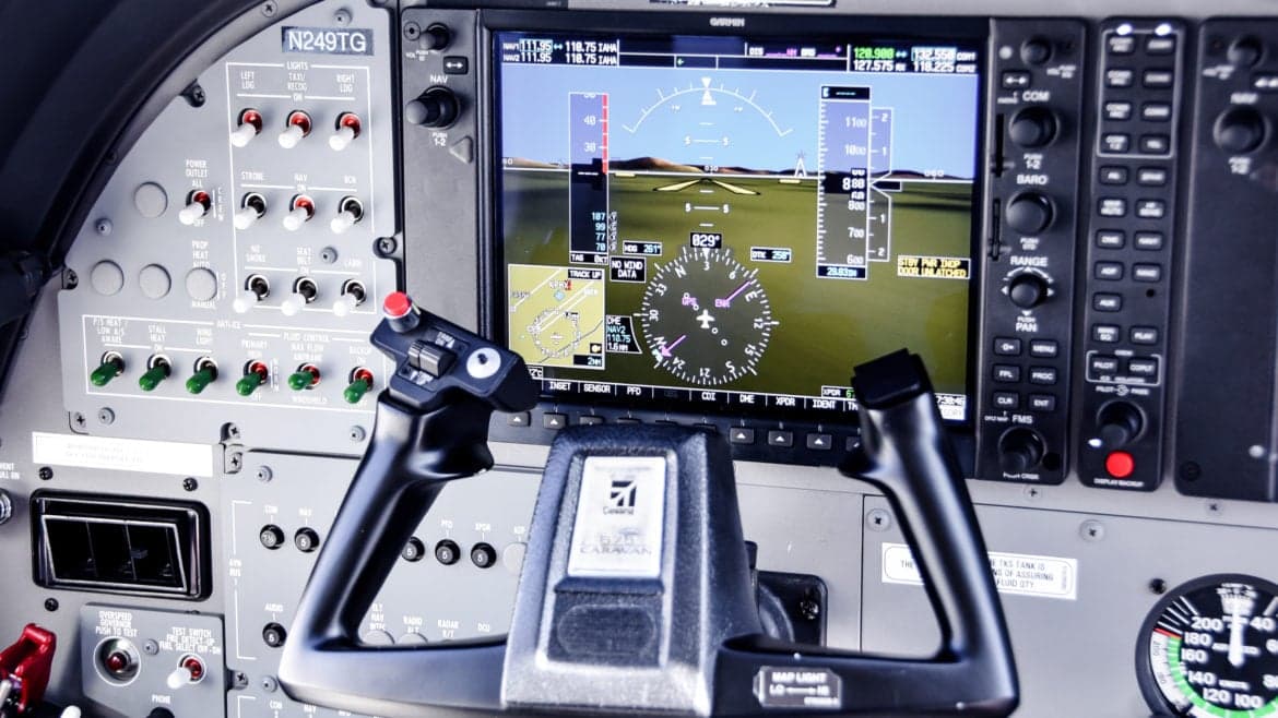 Close up of the instrument panel and yoke of a Cessna Caravan.