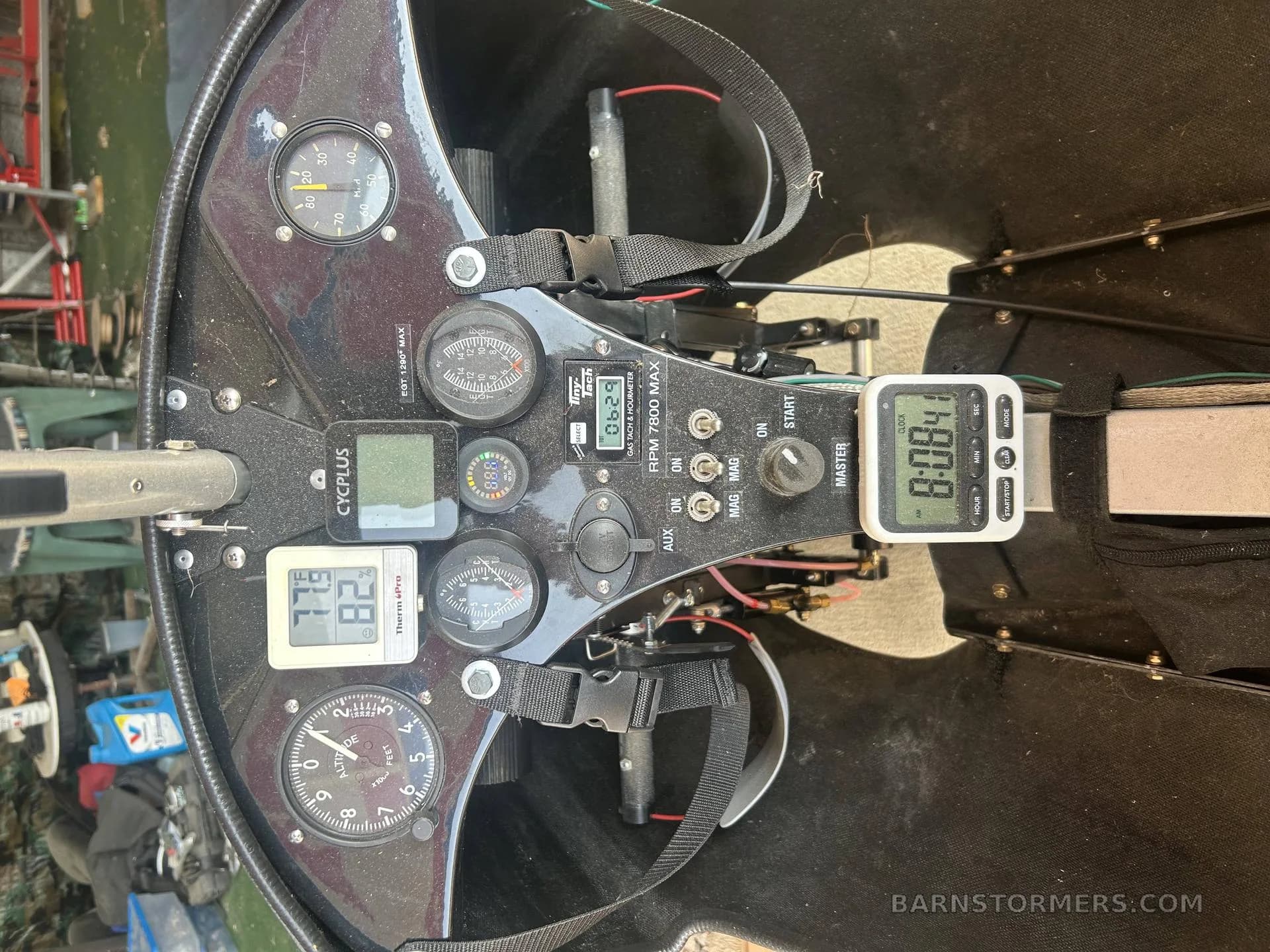 The instrument panel of an ultralight autogyro, showing various analog and digital gauges.