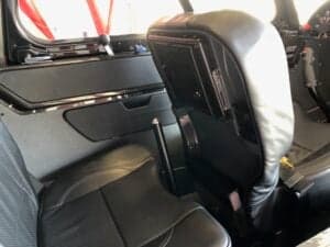 The interior of a Cubcrafters aircraft, showing the seats and side panel.