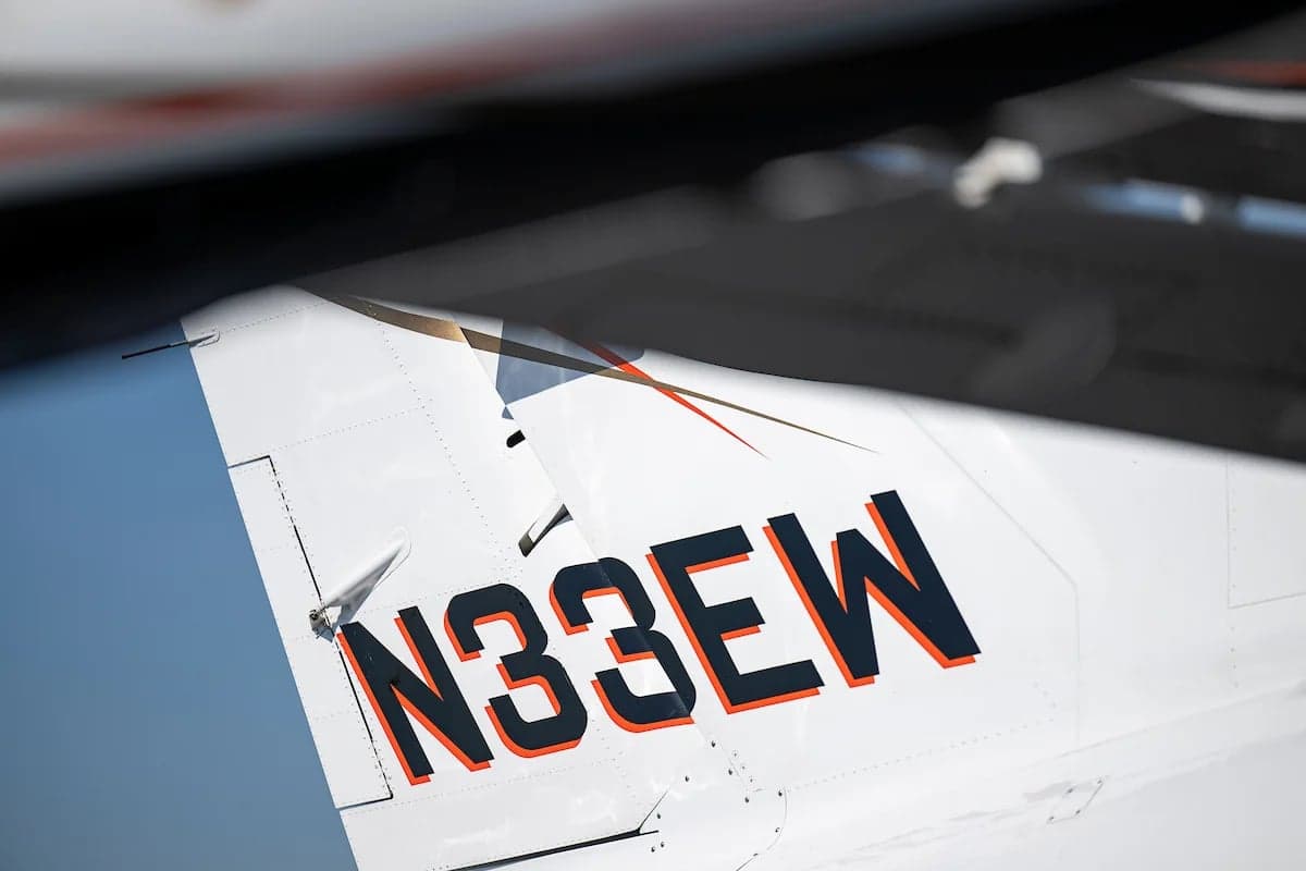 Close up of the tail of the N33EW aircraft showing the registration number.
