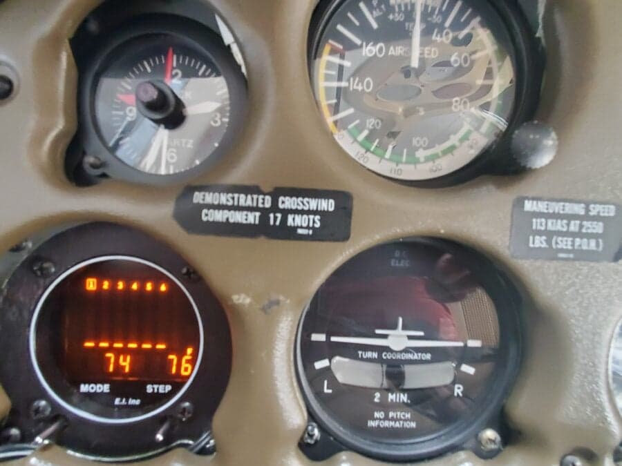 Close-up of the aircraft's airspeed indicator and turn coordinator.