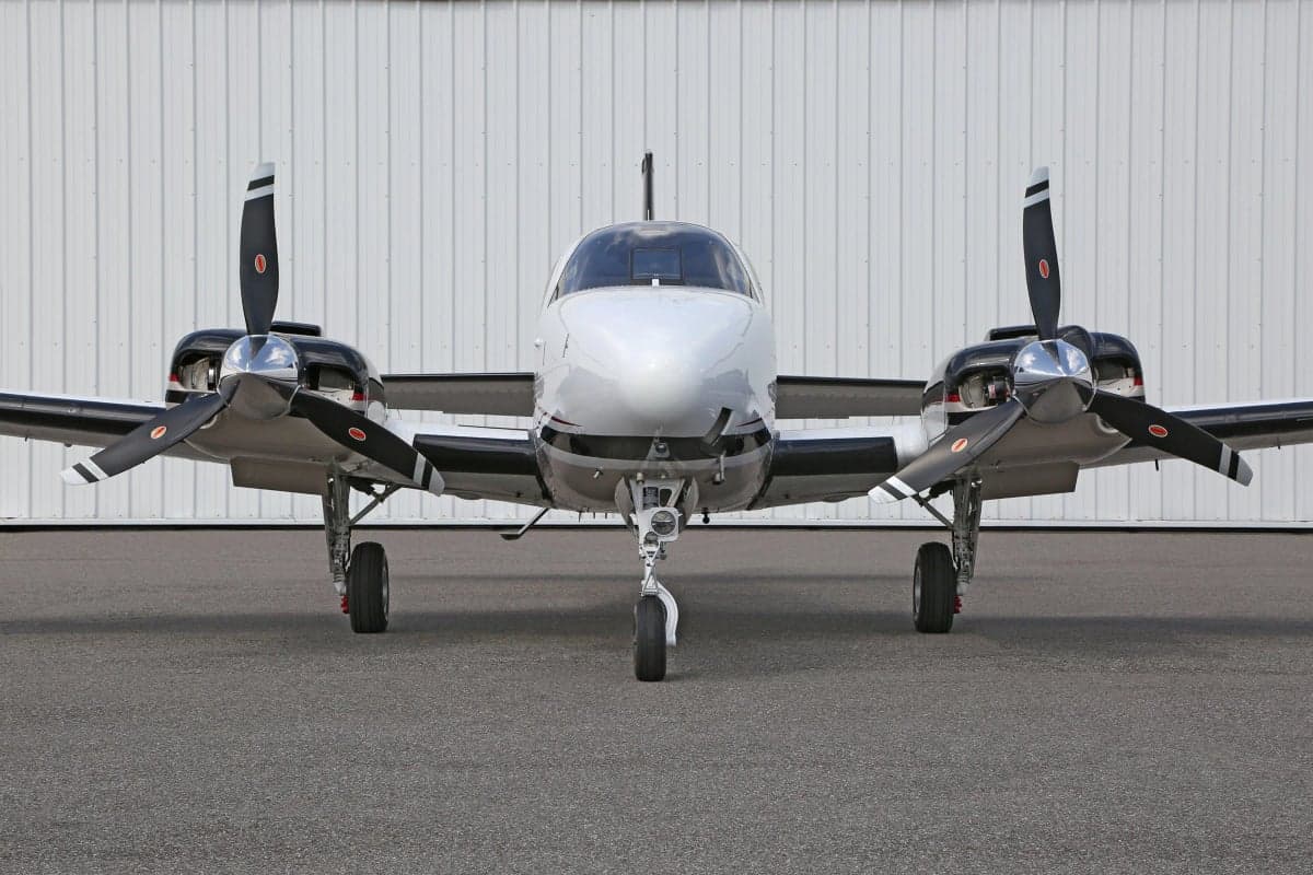 Front view of a Beechcraft Baron G58 aircraft on the ground.