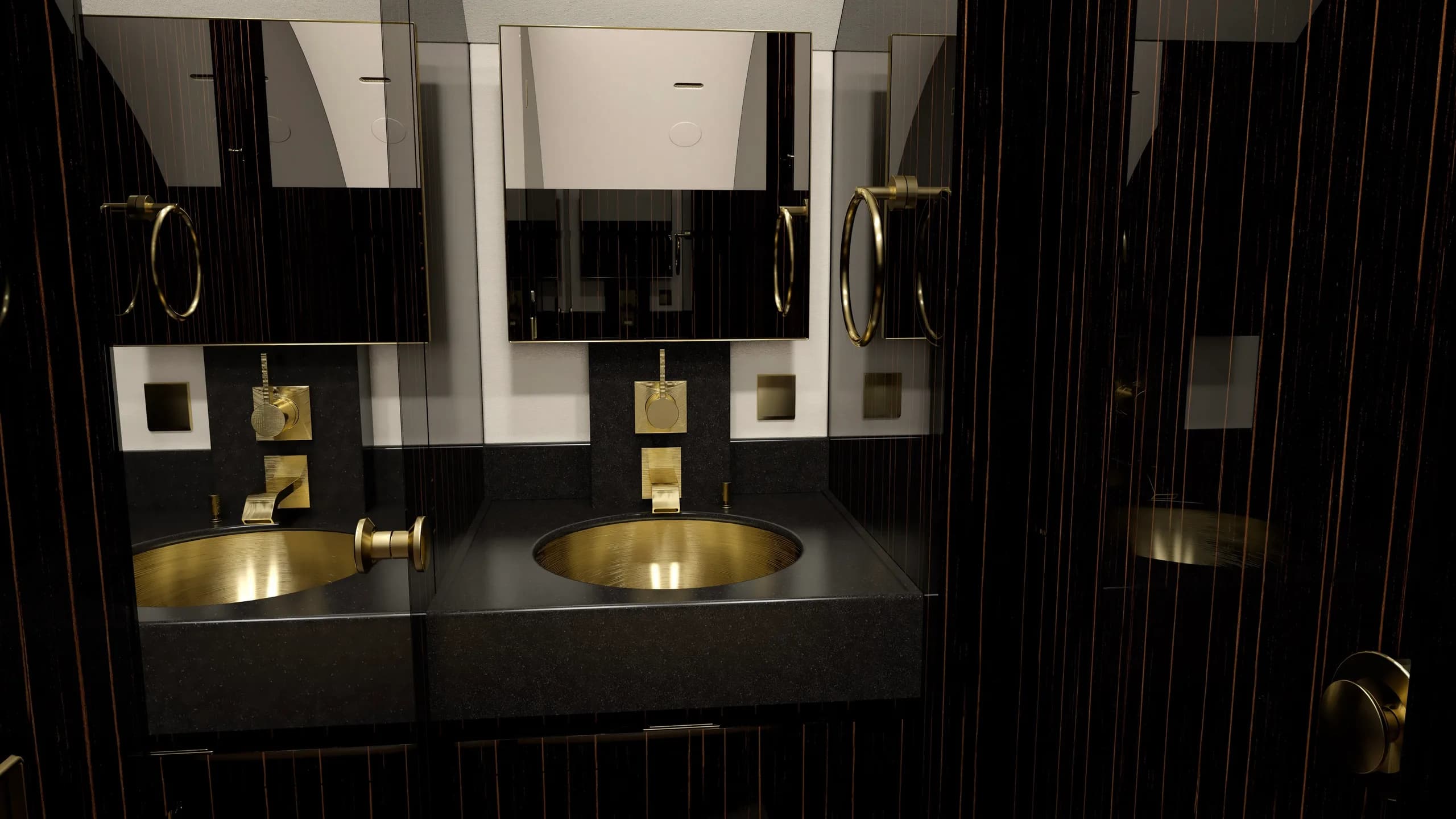 A luxurious aircraft lavatory with two gold sinks, gold fixtures, and dark wood paneling.