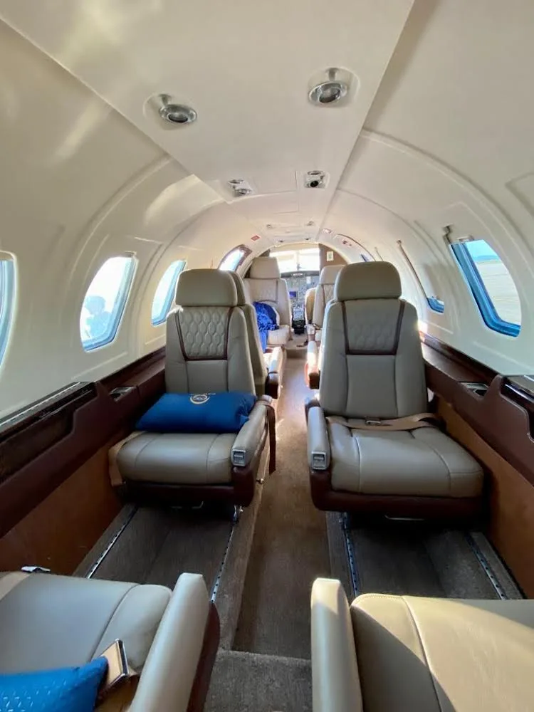 Interior view of the Cessna Citation Mustang cabin with leather seats.