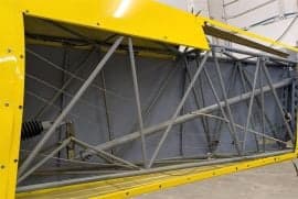 A close-up view of the internal structure of an aircraft wing.