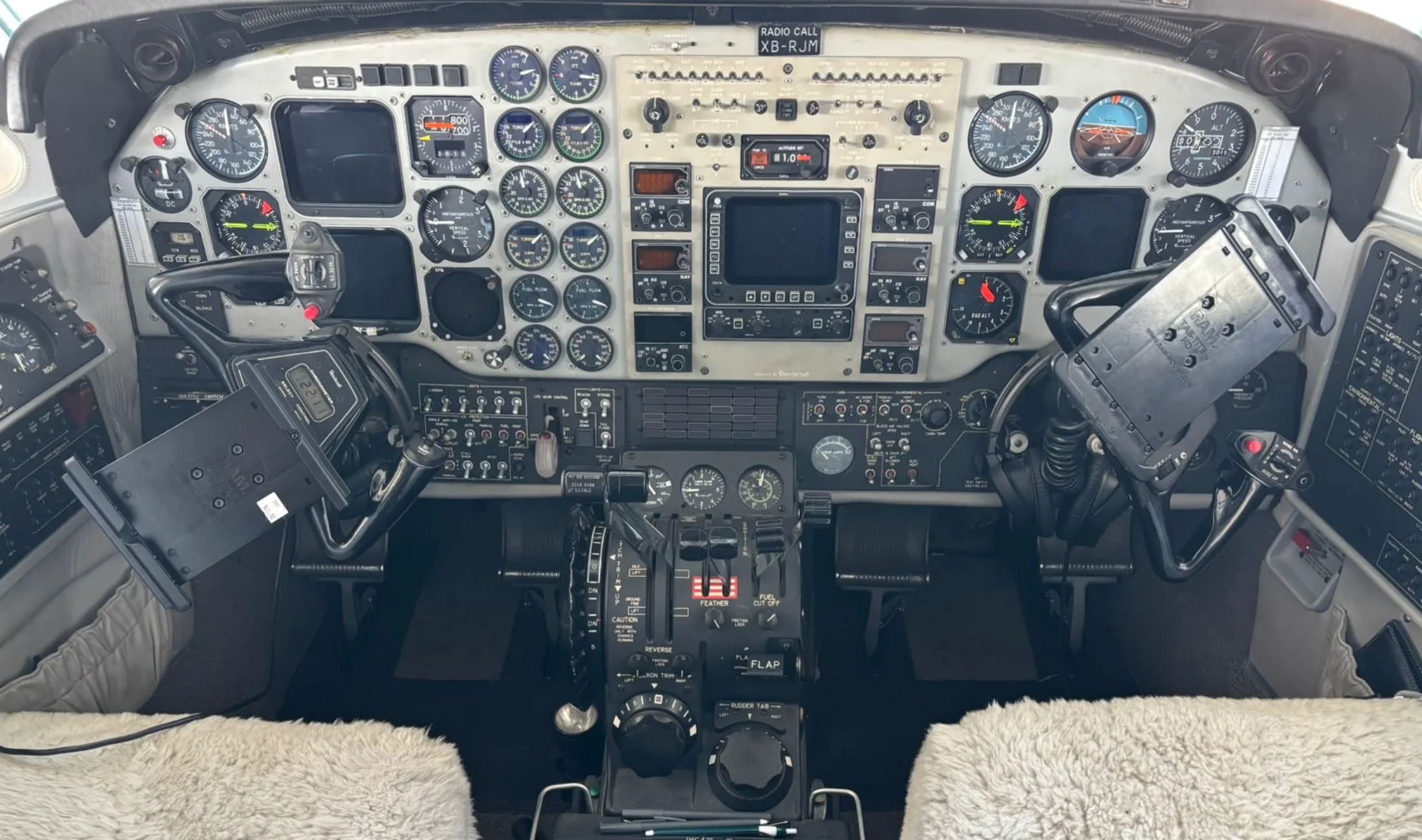 The cockpit of a Beechcraft King Air 350 with the instrument panel and controls.
