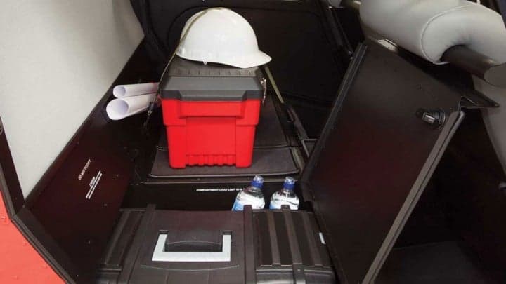 Rear seats of a Robinson helicopter with seatbelts.