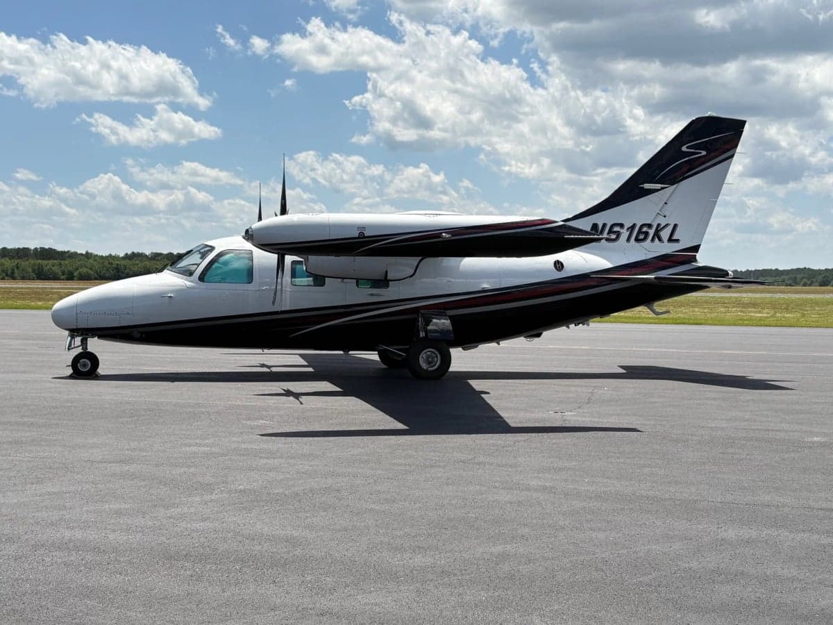Side view of the Partenavia P.68 Observer 2 aircraft N616KL on the tarmac.