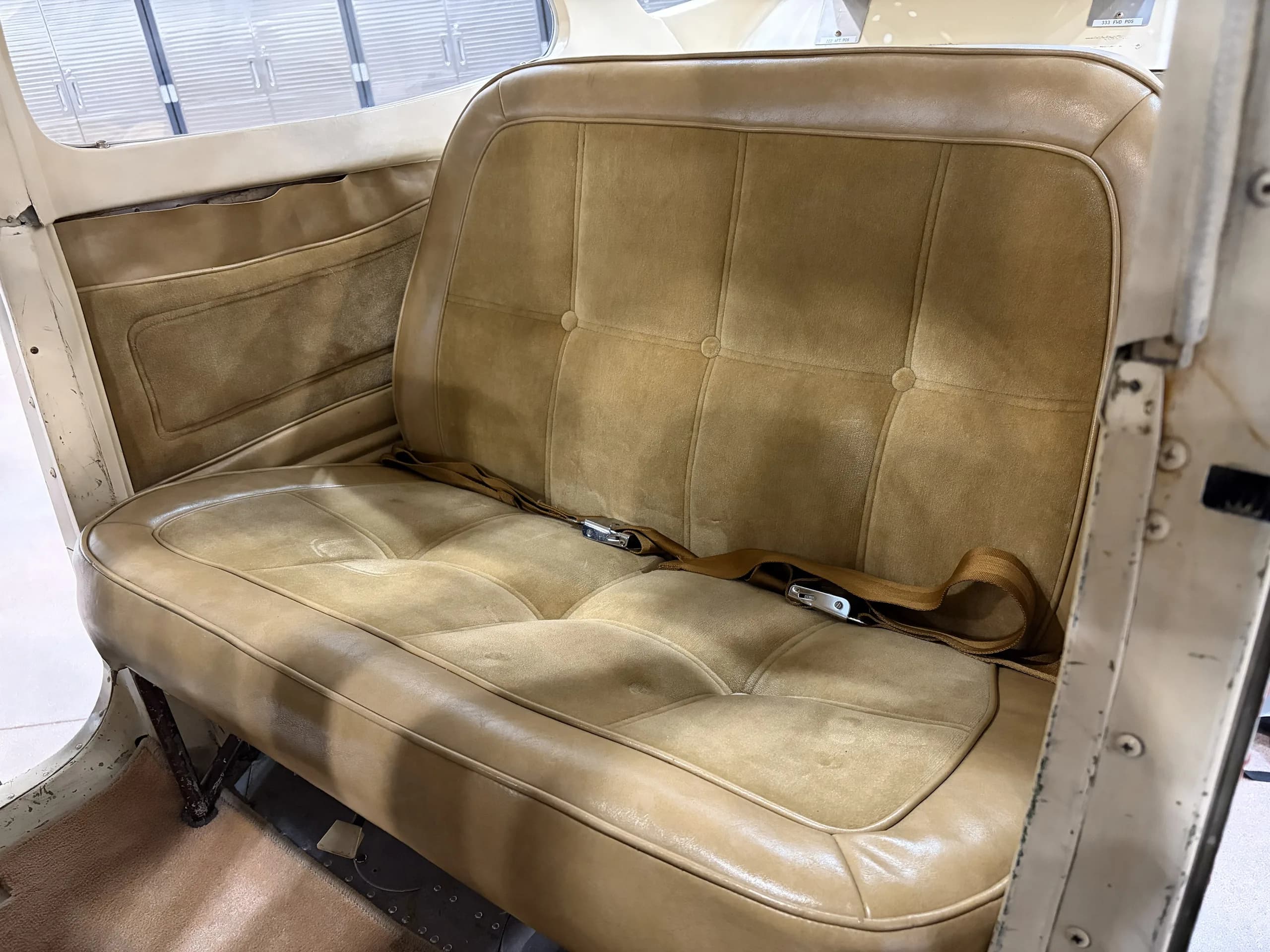 Rear bench seat of a Cessna 172.
