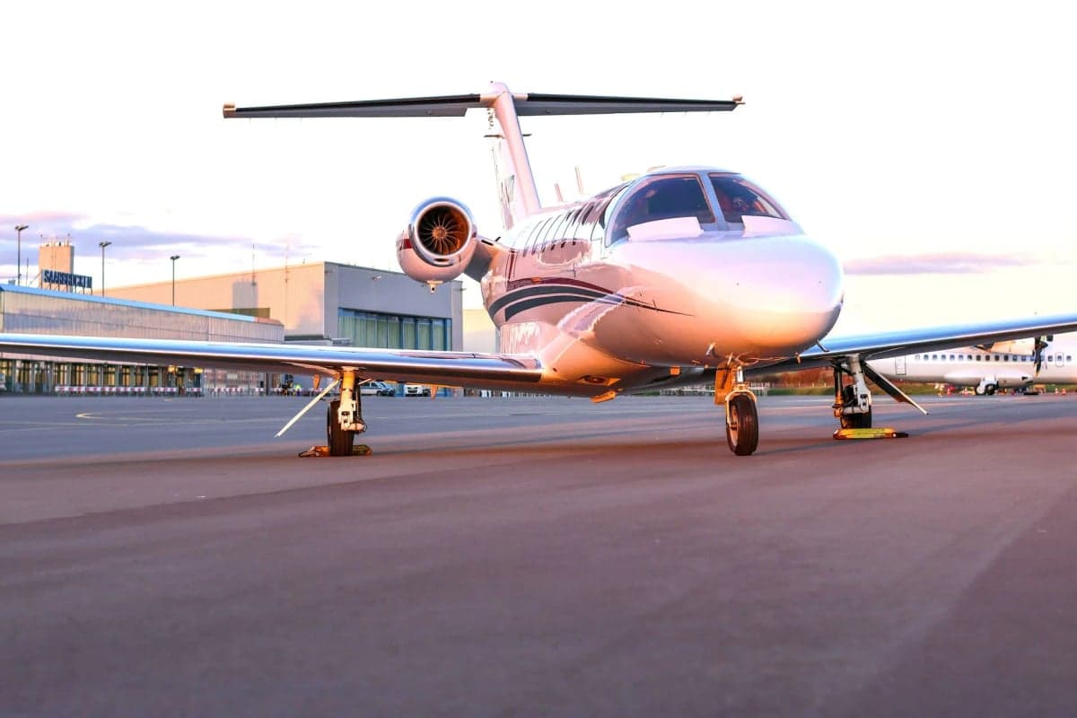 Front view of a Cessna Citation CJ1+ aircraft on the tarmac.