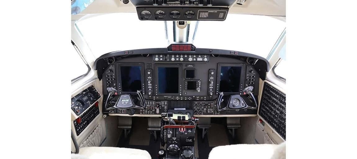 The aircraft's cockpit featuring a modern instrument panel.