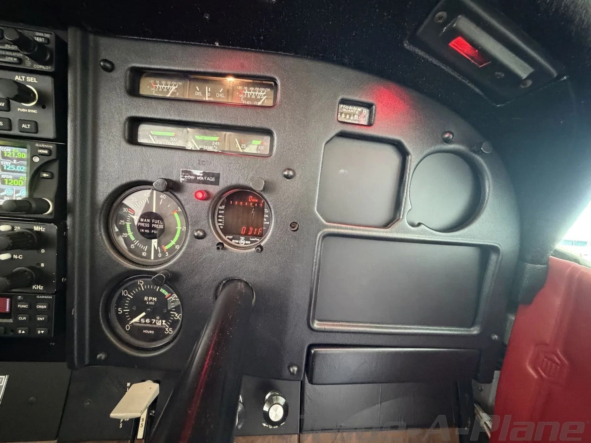 The right side of the aircraft's instrument panel, showing various gauges and blank panels.