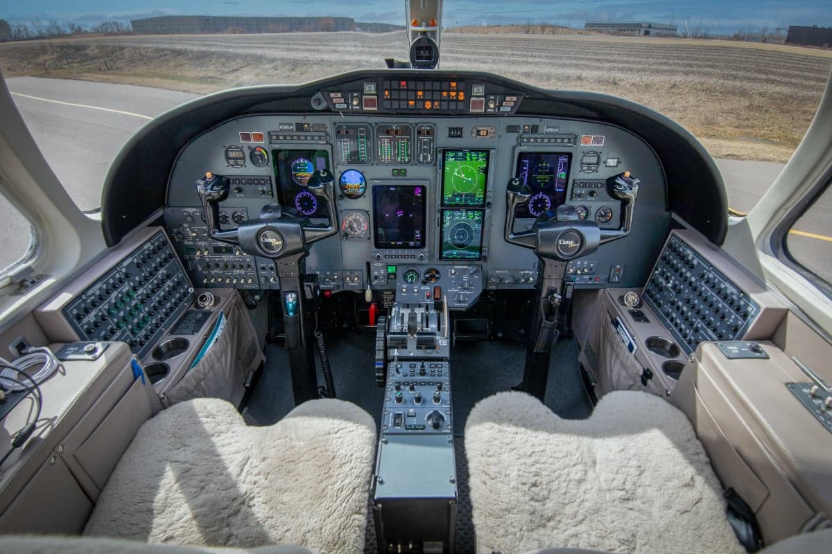 The cockpit of the aircraft features advanced avionics and controls.