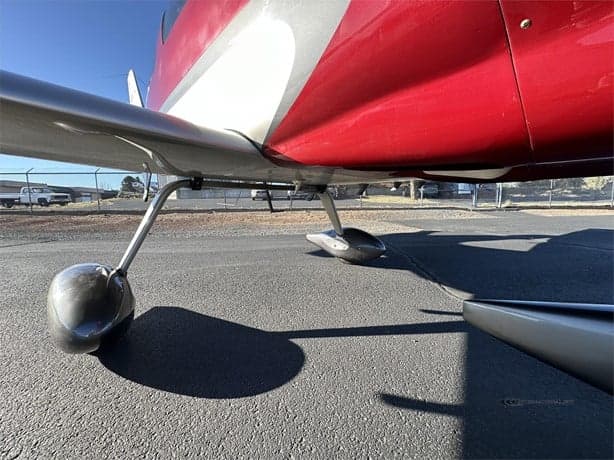 Close-up of the landing gear of the LX7 aircraft.