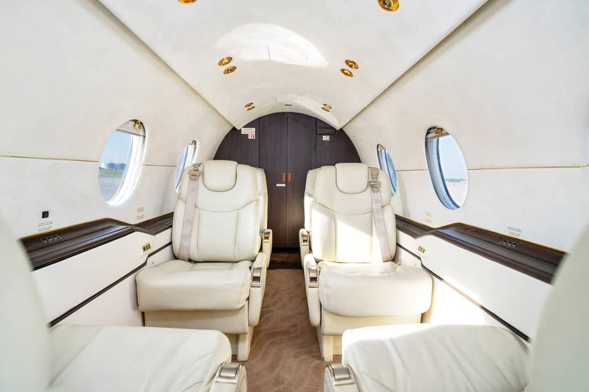Interior view of the Beechcraft Beechjet 400A cabin showing the seating arrangement.