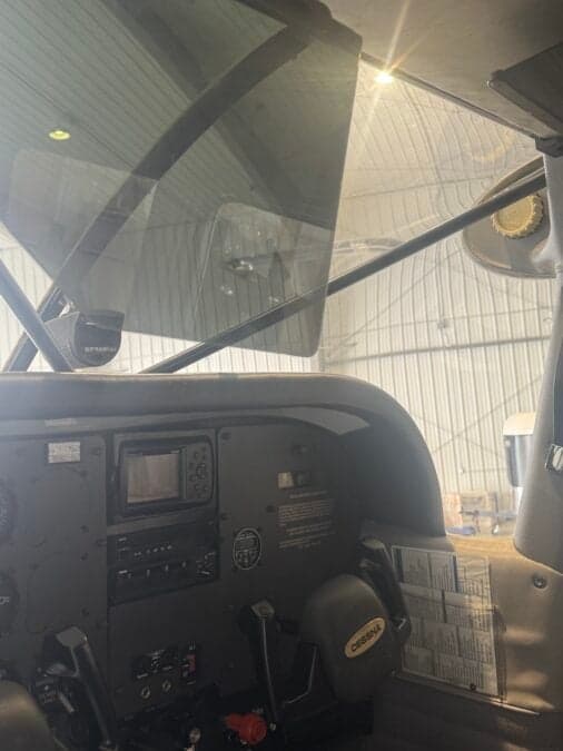 View of the Cessna cockpit from the pilot's seat.