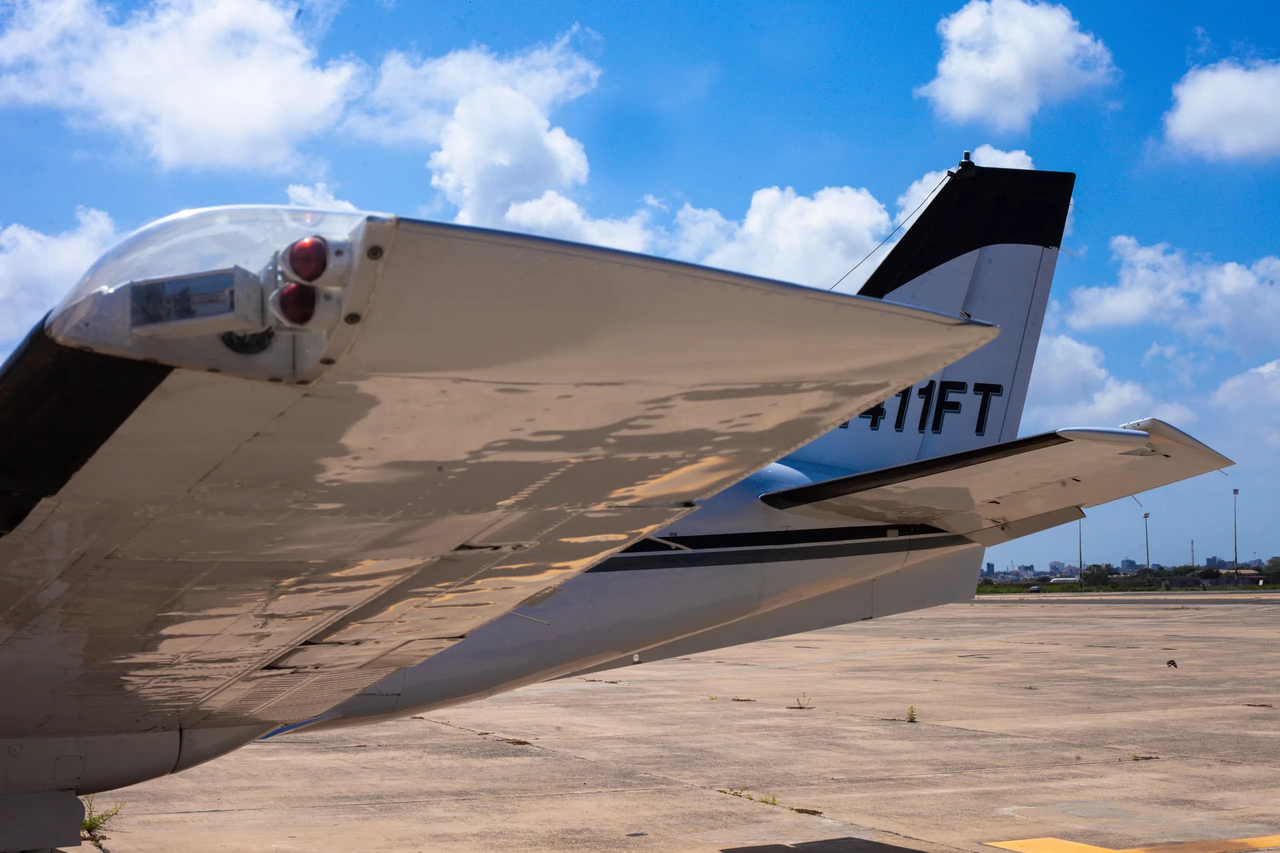 The tail of a King Air N411FT is shown.