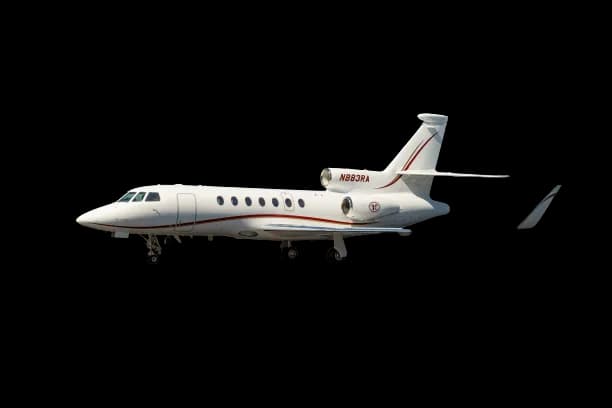 Generic side view of a white private jet aircraft with red stripes.