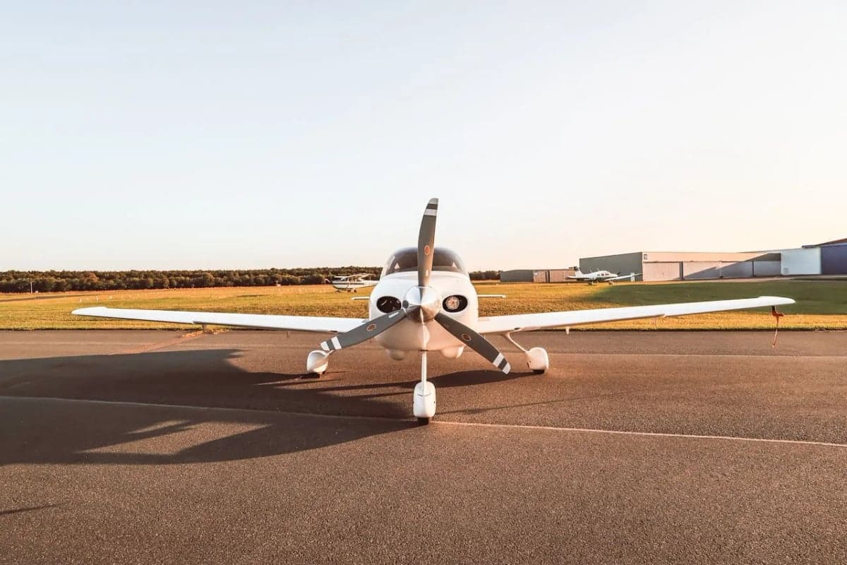 Front view of Cirrus SR22 aircraft N133CD on the tarmac.