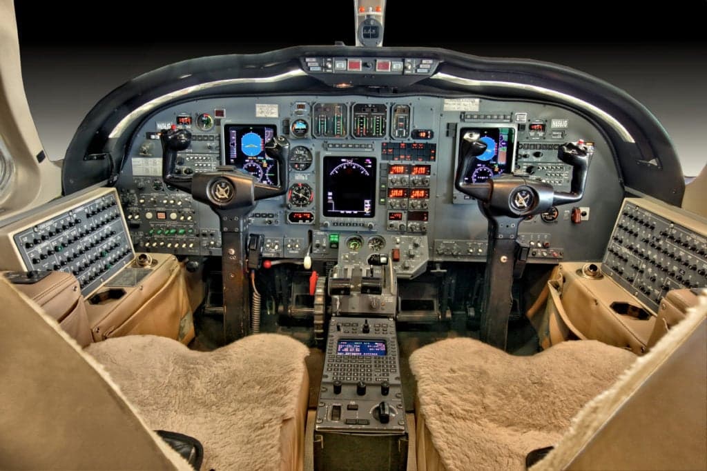 Detailed view of the Citation Ultra cockpit instrument panel and controls.