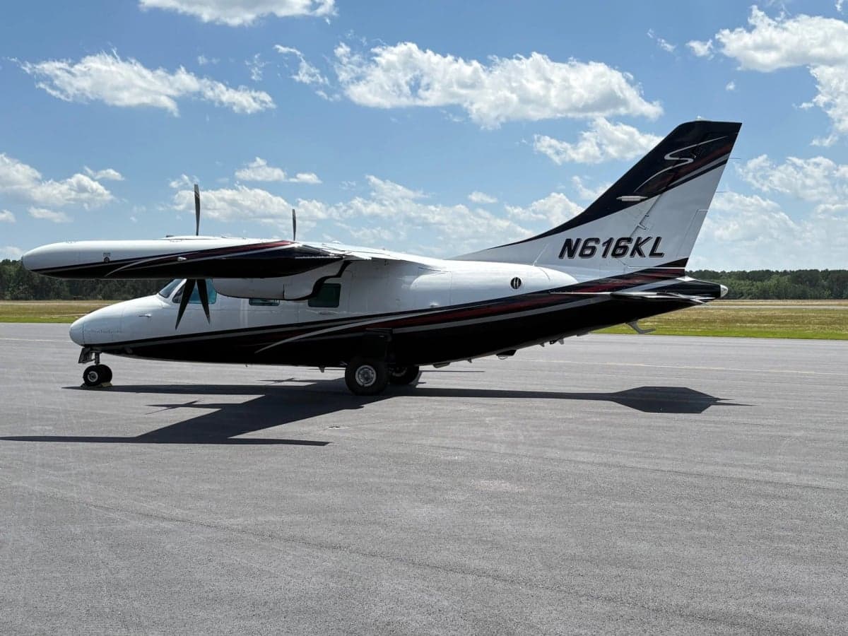 Another side view of the Partenavia P.68 Observer 2 aircraft N616KL on the tarmac.