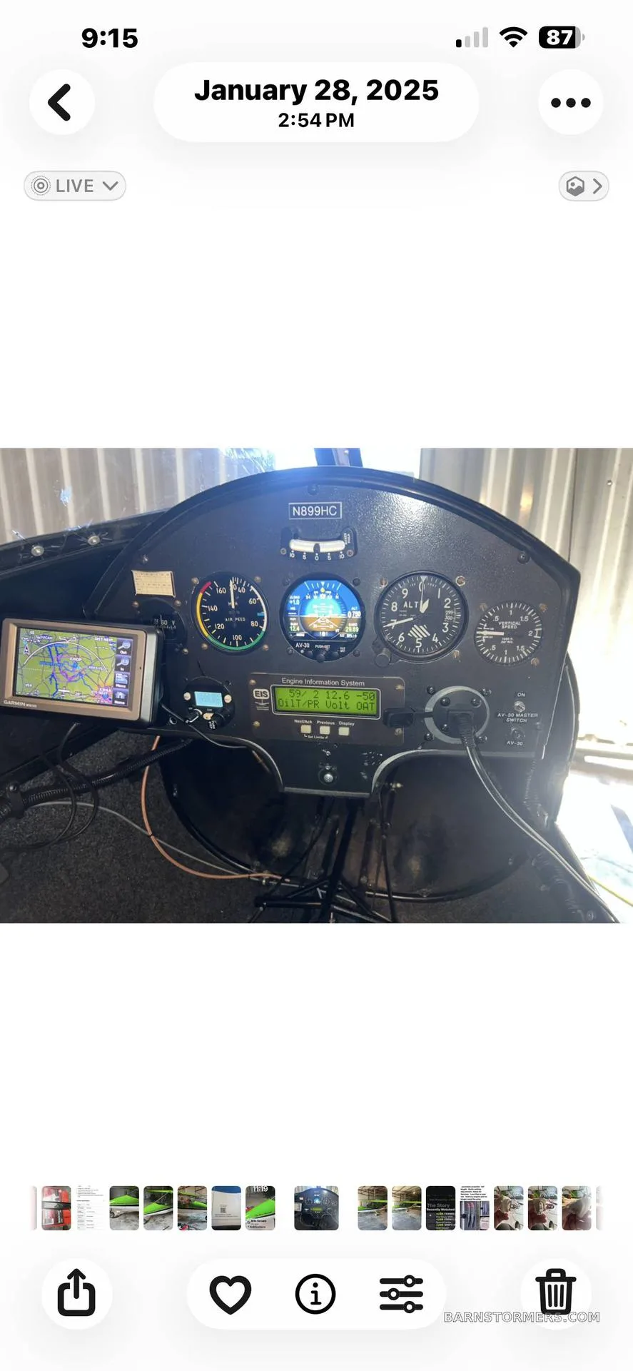 The cockpit of a light aircraft features an instrument panel with analog gauges, a digital engine information system, and a tablet for navigation.