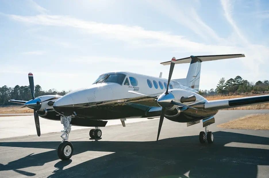 A King Air B200 aircraft on the tarmac.
