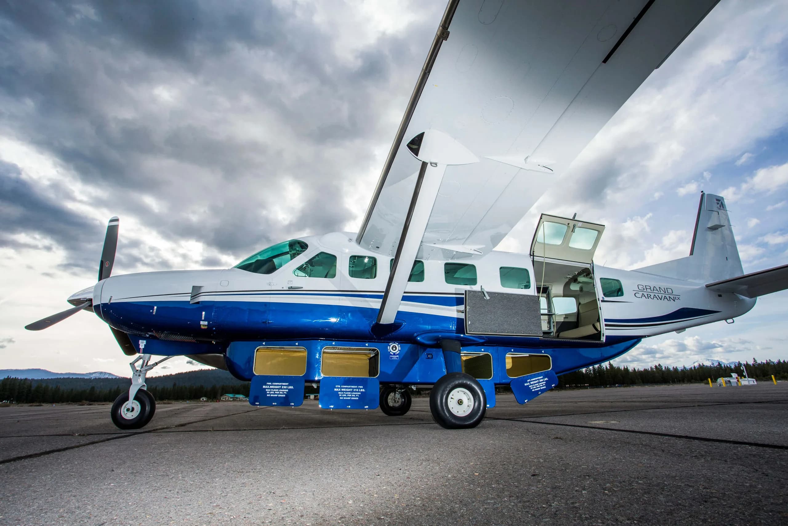 Cessna Grand Caravan on the ground with doors open.